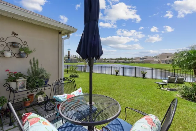 a view of a garden with a lake view