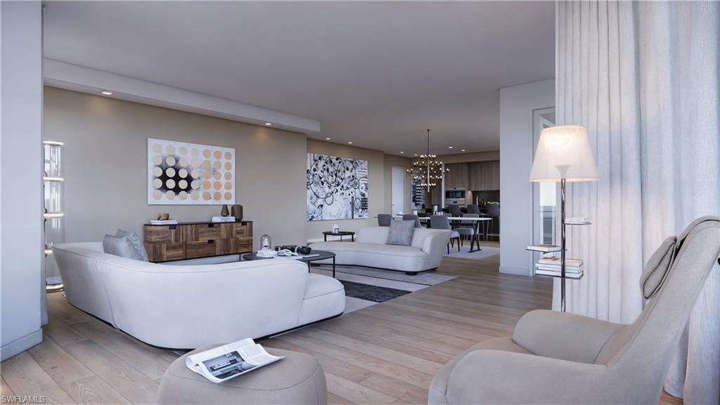 1301 3rd Avenue South, Unit 7405 Naples, FL 34102 - Photo 12 of 22 a living room with furniture and a large window