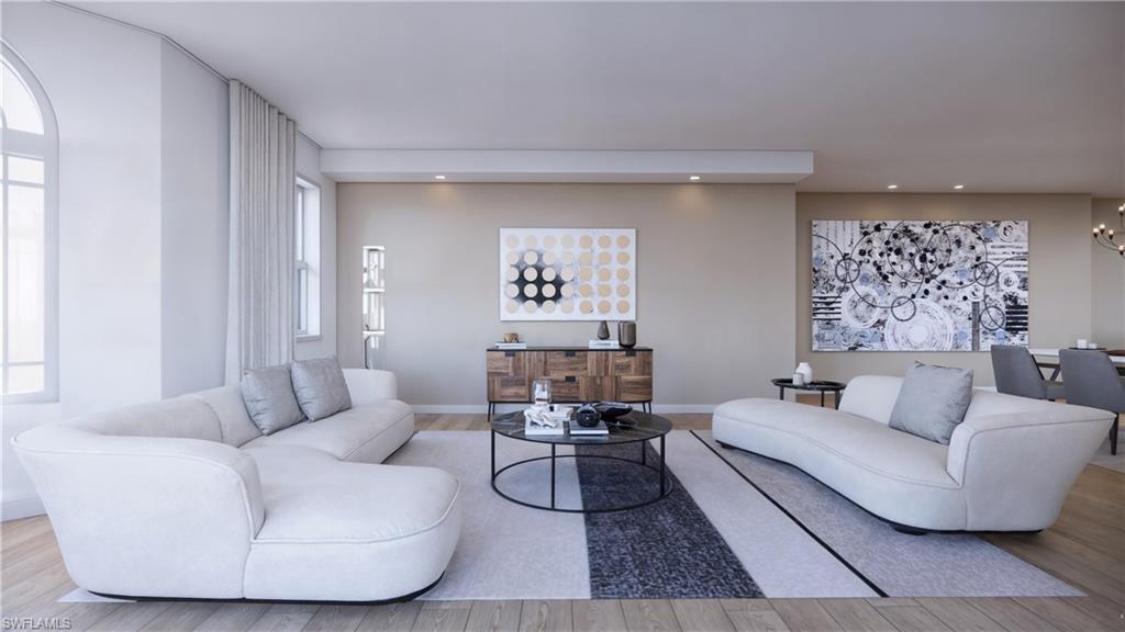 1301 3rd Avenue South, Unit 7405 Naples, FL 34102 - Photo 10 of 22 a living room with furniture and a couch
