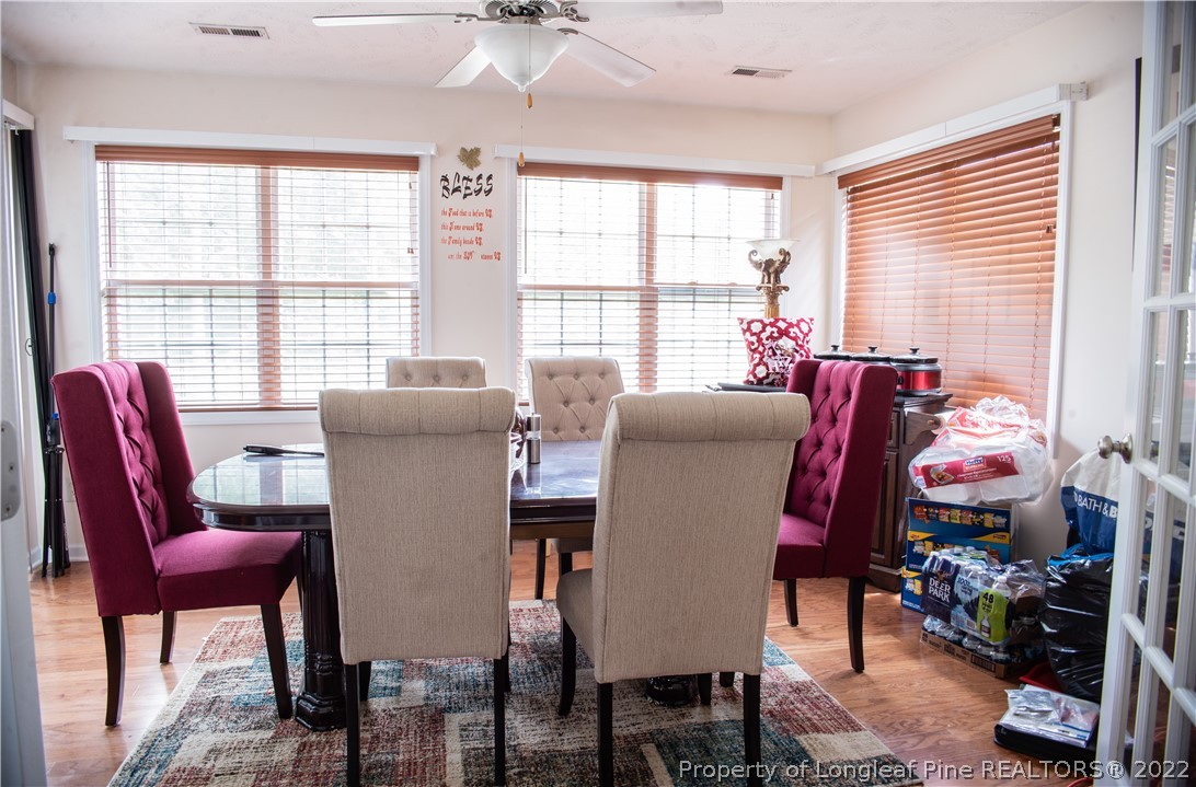 200 Lattimore Road Cameron, NC 28326 - Photo 15 of 32 a view of a dining room with furniture and a window