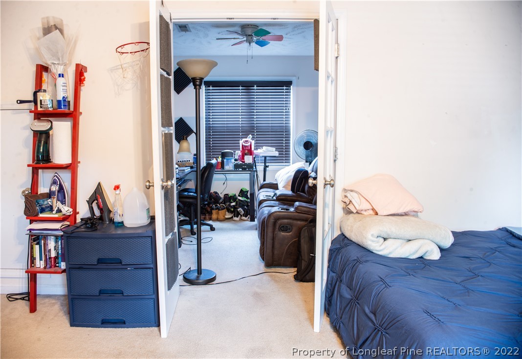 200 Lattimore Road Cameron, NC 28326 - Photo 23 of 32 a view of living room with furniture and closet