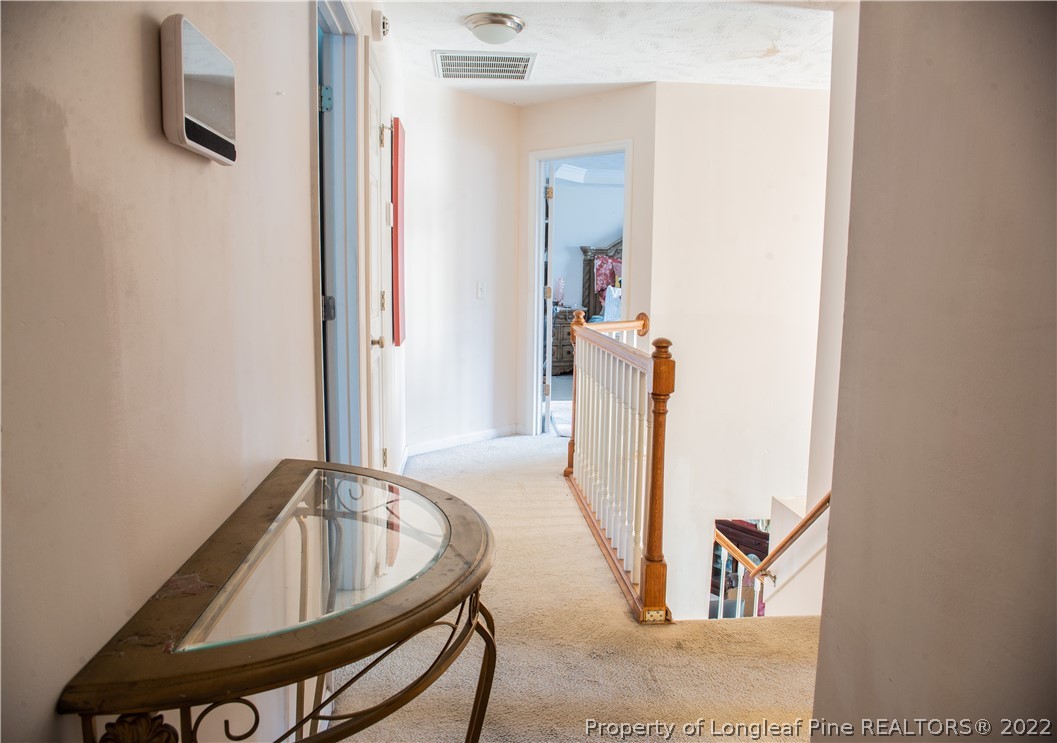 200 Lattimore Road Cameron, NC 28326 - Photo 24 of 32 a view of living room with furniture and wooden floor