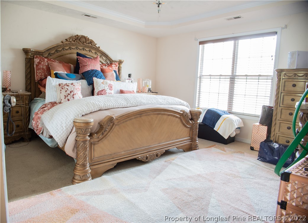 200 Lattimore Road Cameron, NC 28326 - Photo 26 of 32 a bedroom with bed and a large window
