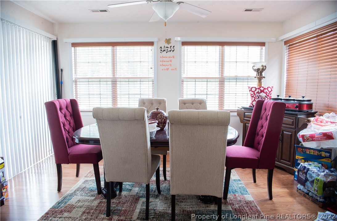 200 Lattimore Road Cameron, NC 28326 - Photo 8 of 32 a view of a dining room with furniture window and outside view