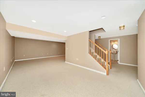 a view of a house with a door and wooden floor