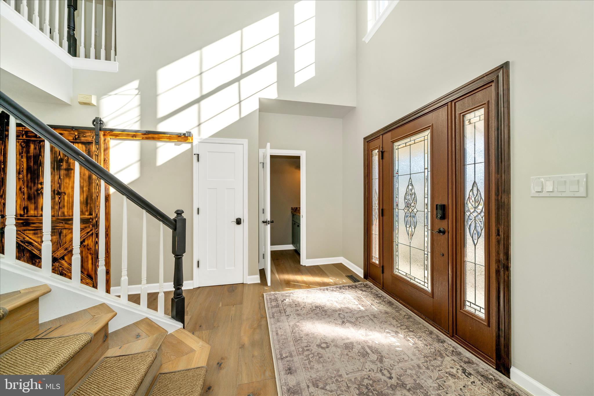 601 Huntover Lane Frederick, MD 21703 - Photo 5 of 73 Impressive two-story foyer with powder room.