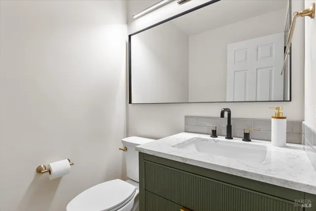 a bathroom with a sink and a toilet