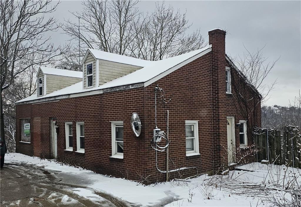2851 Mt Troy Road Pittsburgh, PA 15212 - Photo 1 of 19 a front view of a house with a yard