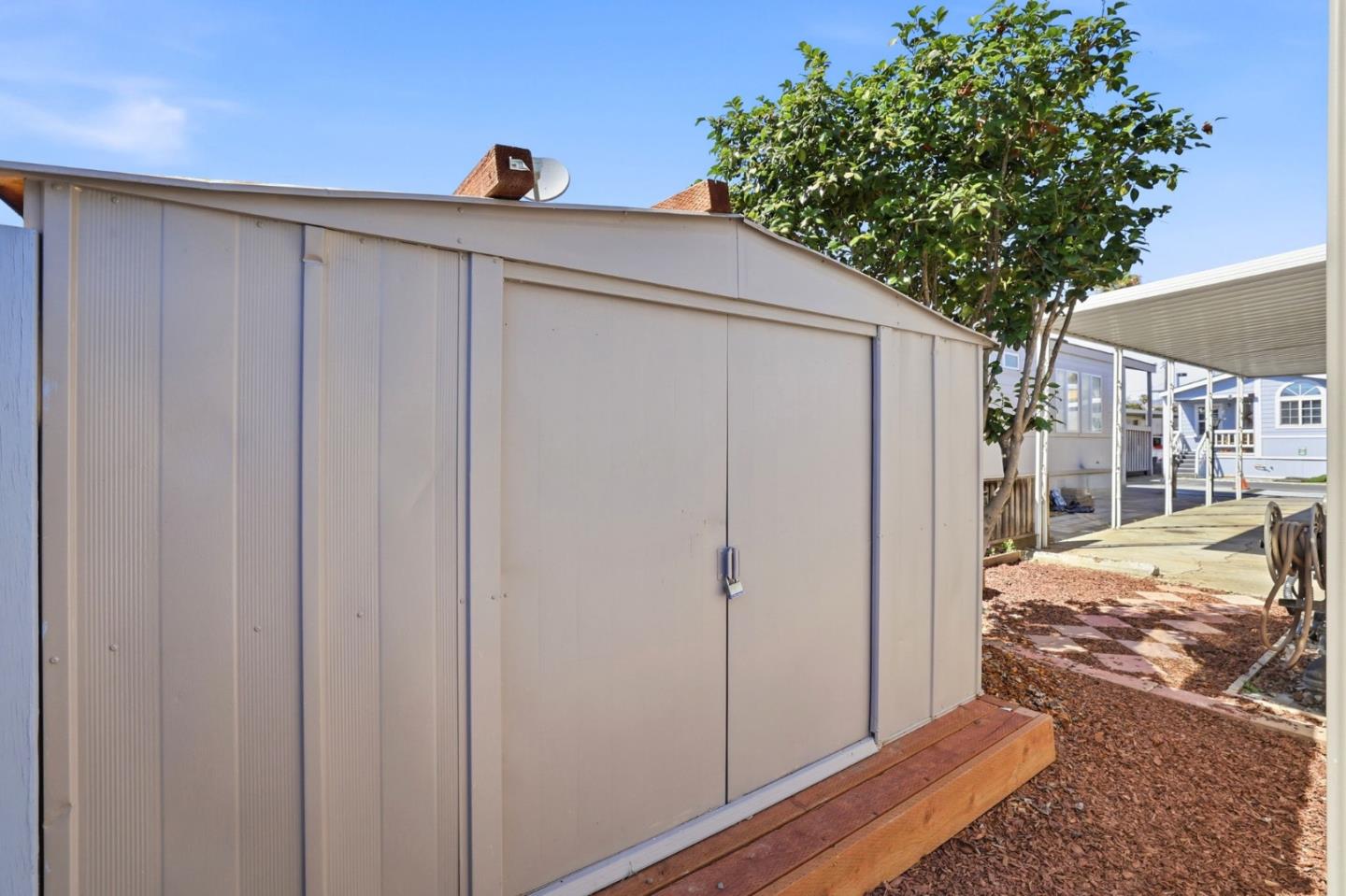 555 Umbarger Road, Unit 31 San Jose, CA 95111 - Photo 15 of 18 a view of a house with a backyard
