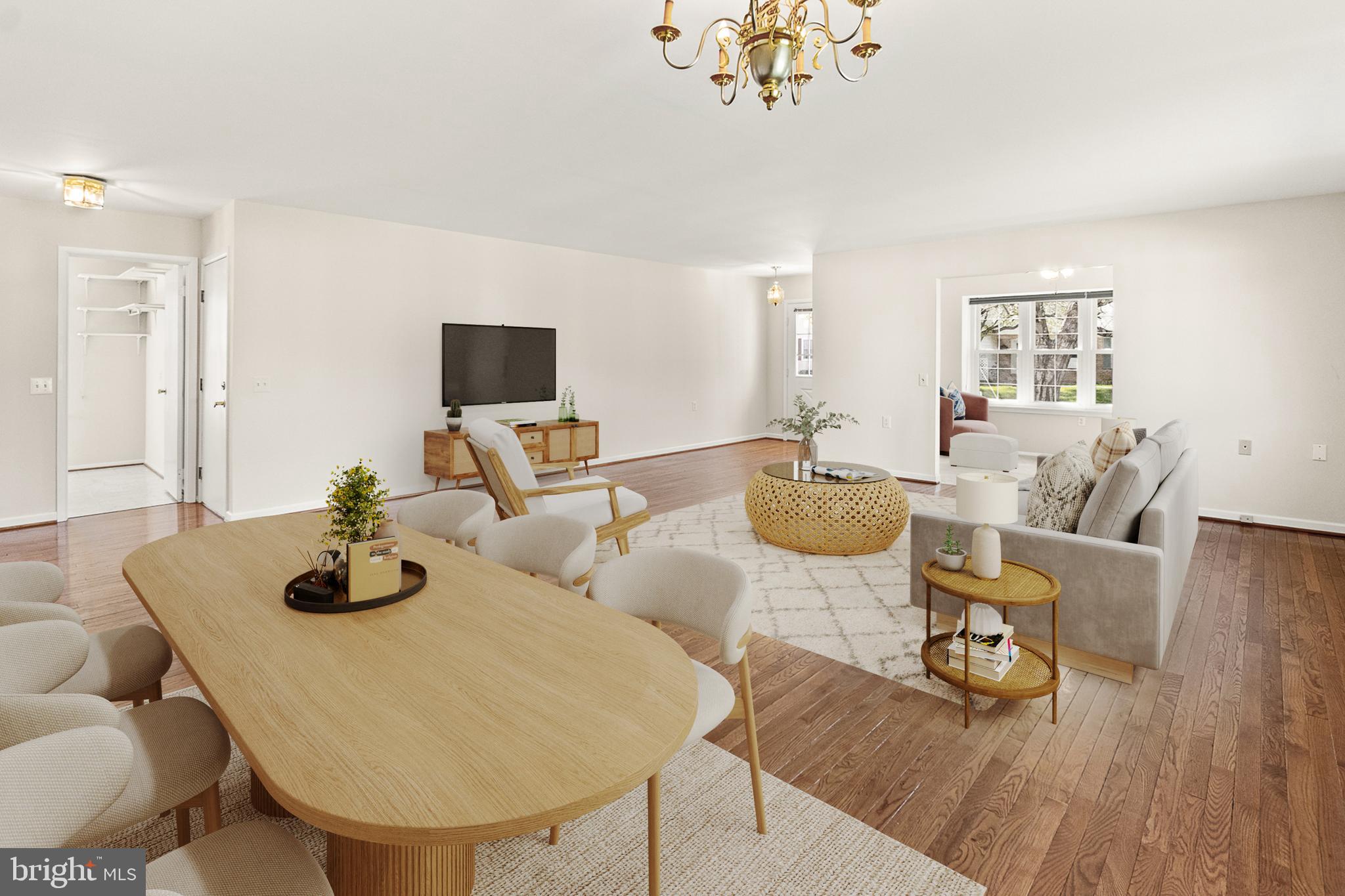 7050 Catalpa Road Frederick, MD 21703 - Photo 7 of 78 a living room with furniture and a wooden floor