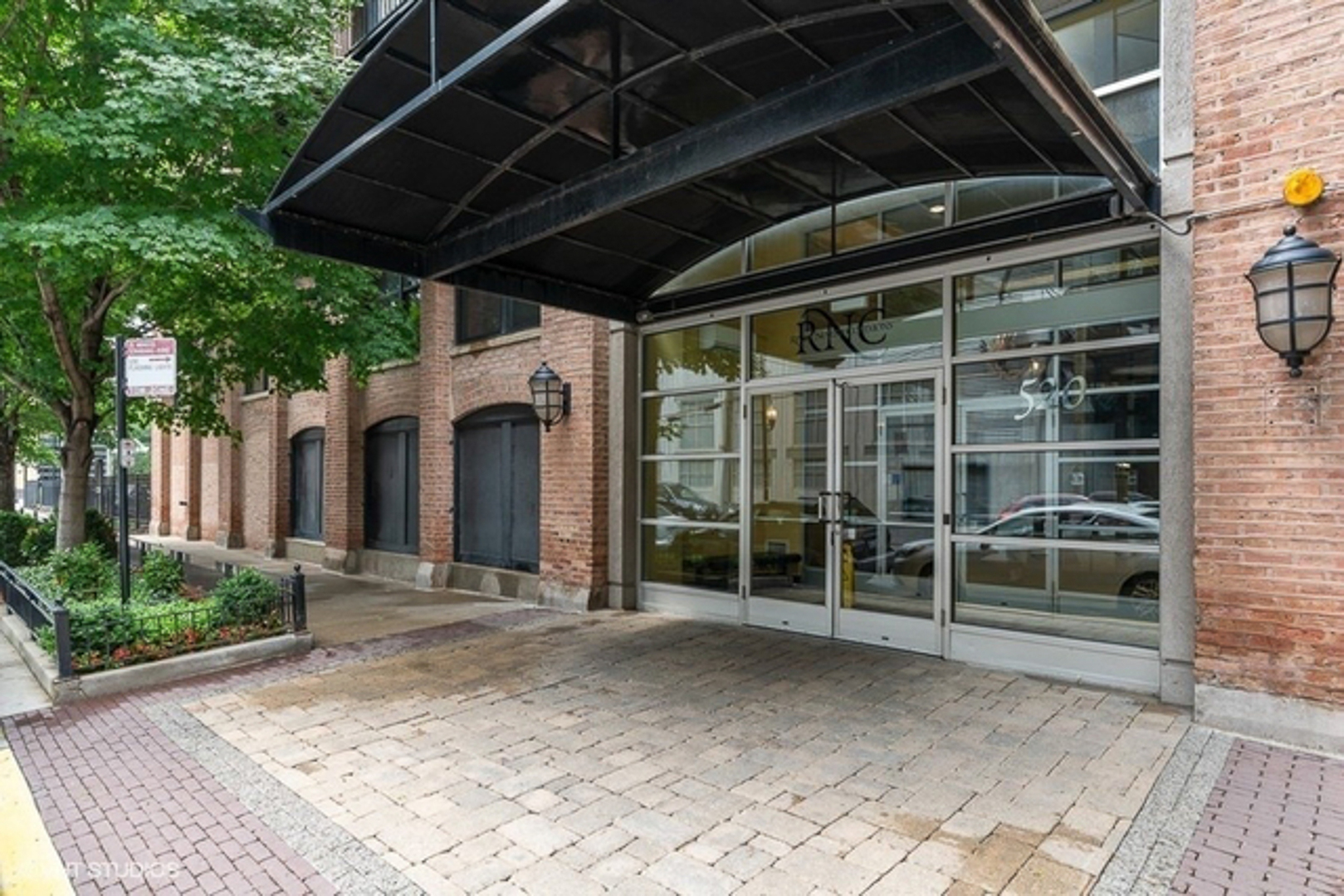 520 West Huron Street, Unit 116 Chicago, IL 60654 - Photo 2 of 28 a view of a car parking garage