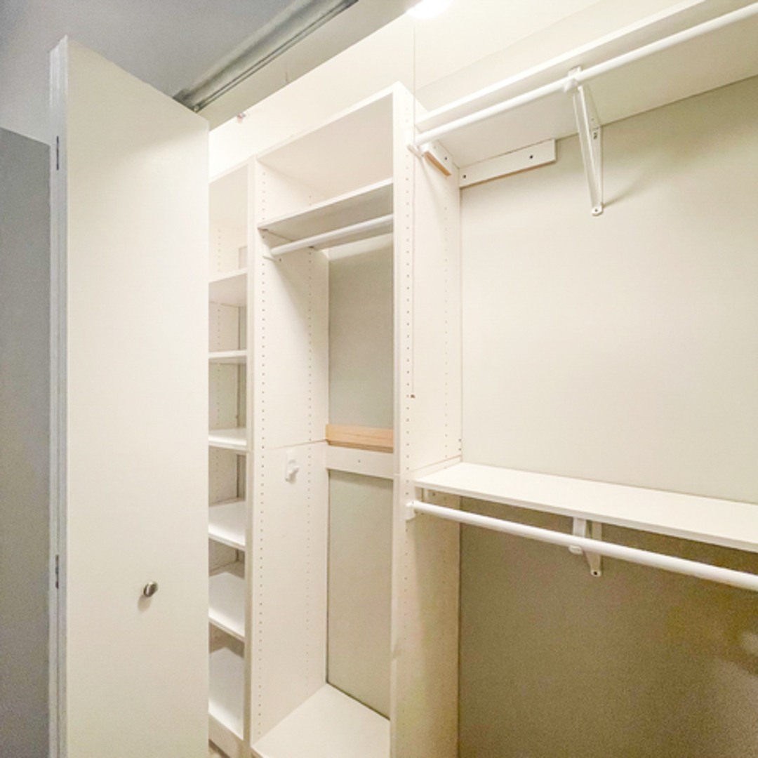 520 West Huron Street, Unit 116 Chicago, IL 60654 - Photo 15 of 28 a view of walk in closet with empty racks