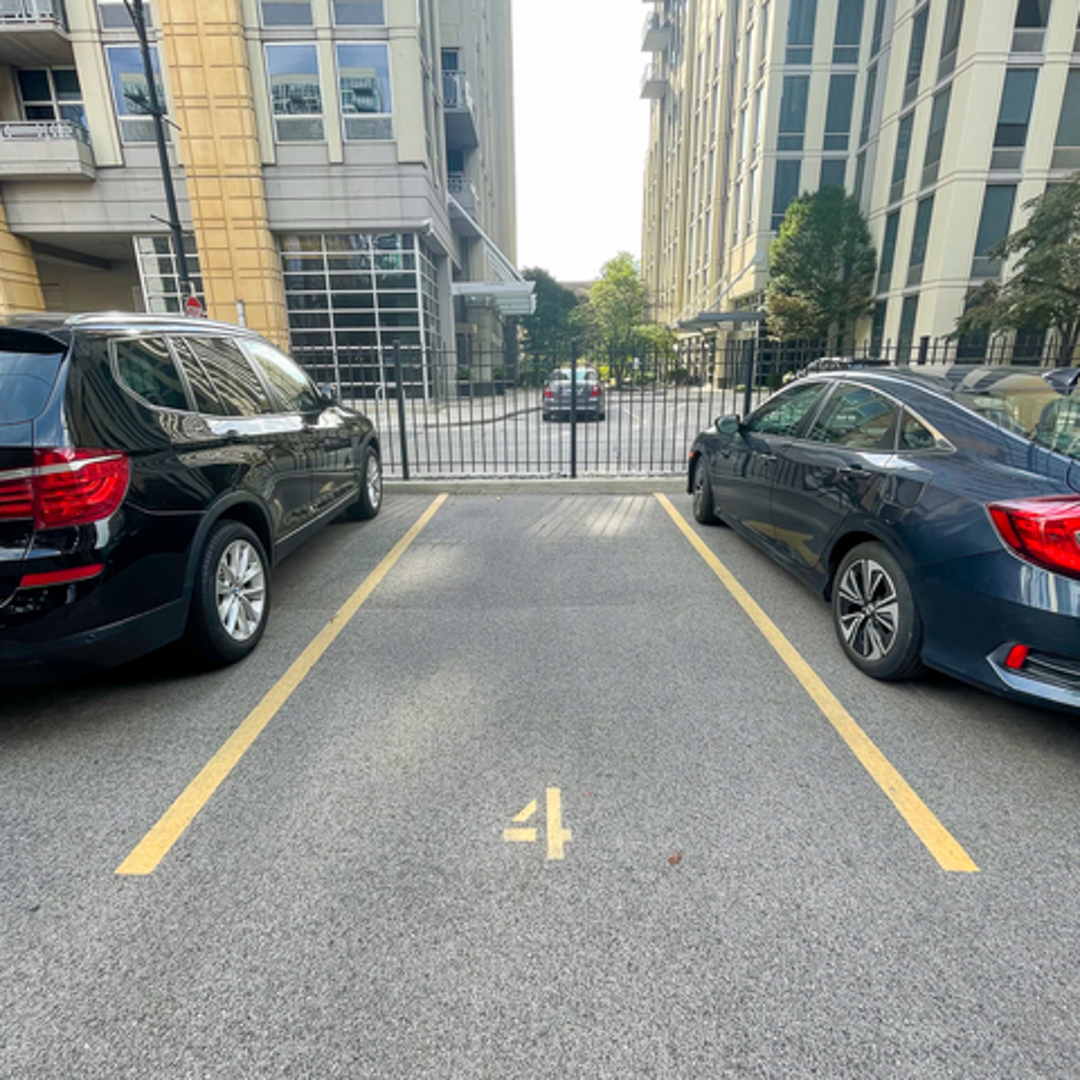 520 West Huron Street, Unit 116 Chicago, IL 60654 - Photo 26 of 28 a view of a car parked in front of a building
