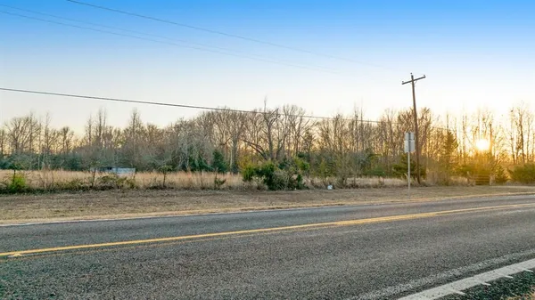 a view of a town with barn house