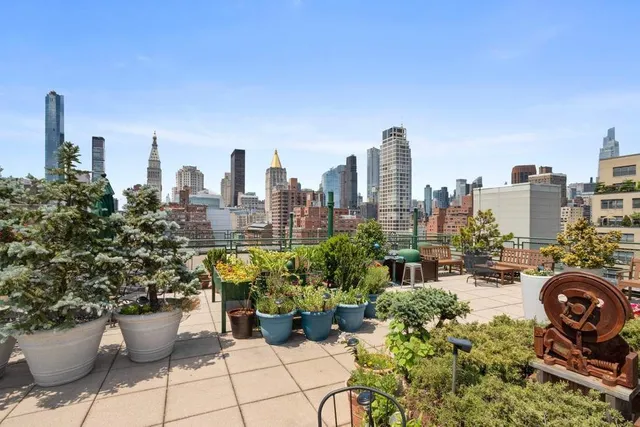a view of a terrace with sitting area