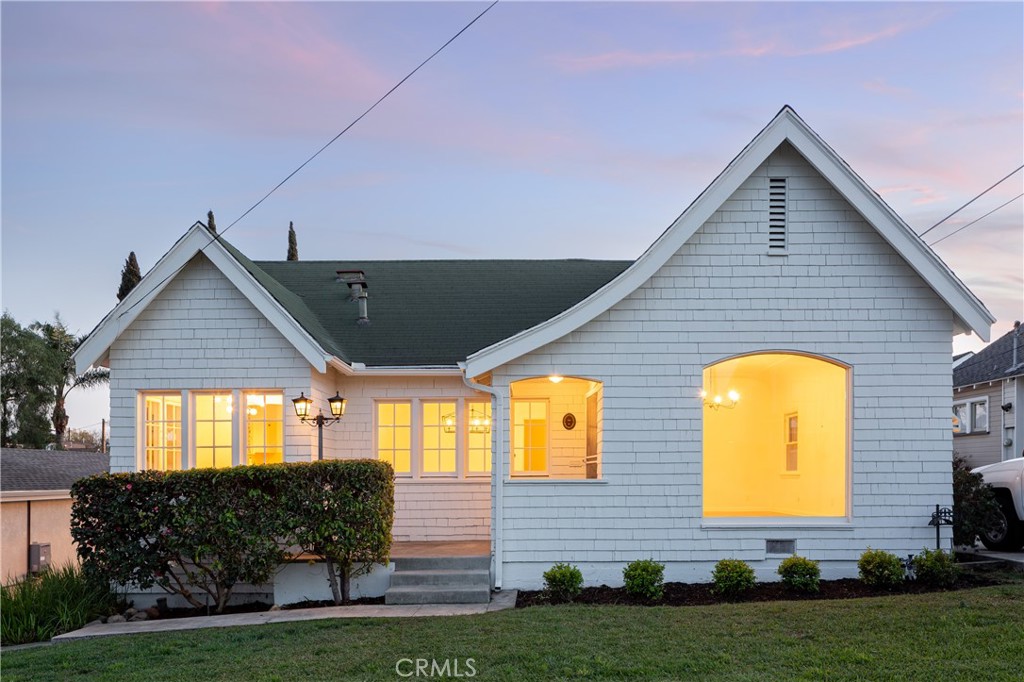 a front view of house with yard