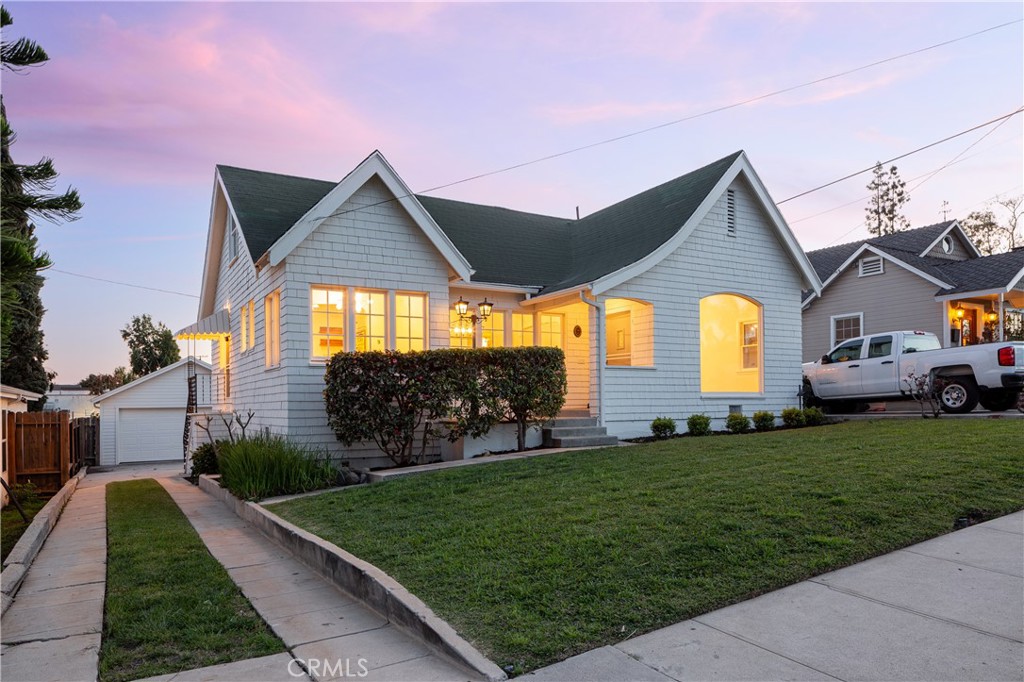 210 West Elm Street Brea, CA 92821 - Photo 2 of 3 a front view of a house with a yard