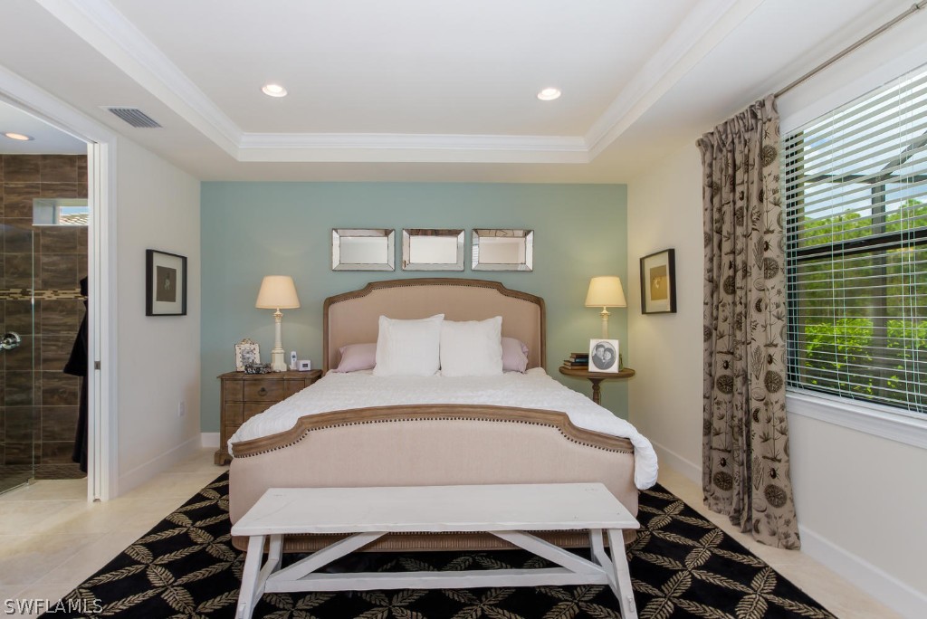 10866 Rutherford Road Fort Myers, FL 33913 - Photo 16 of 25 a bedroom with a bed and a window