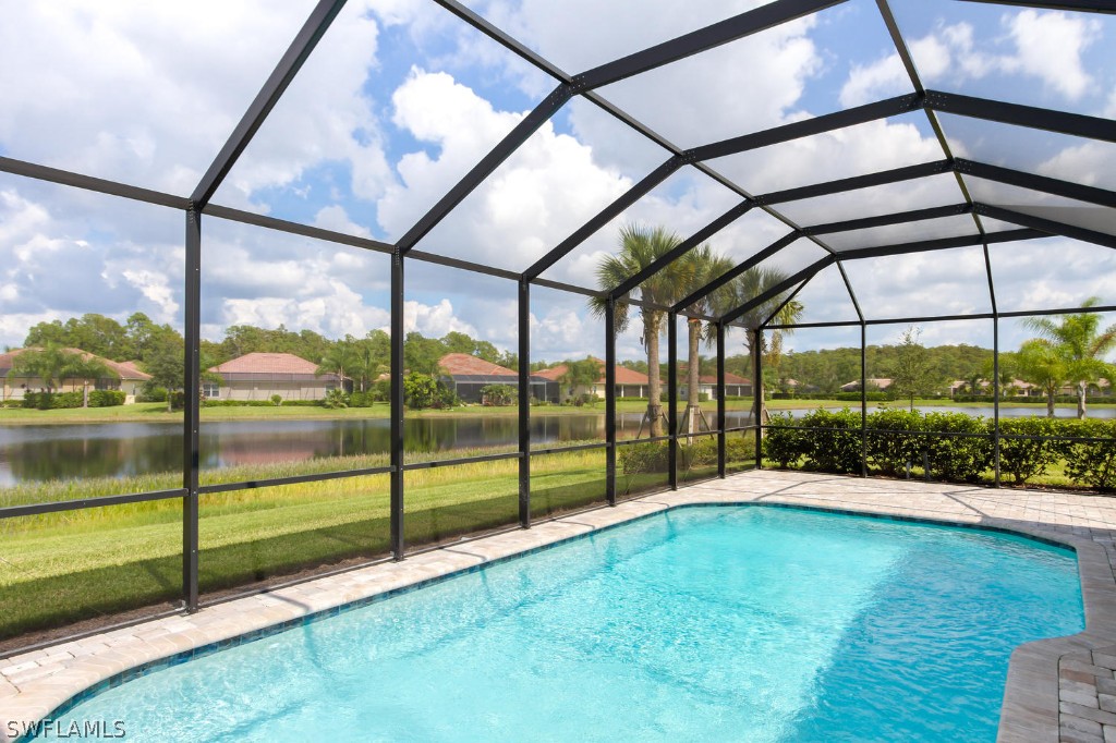 10866 Rutherford Road Fort Myers, FL 33913 - Photo 22 of 25 a view of an empty room with a floor to ceiling window next to a yard