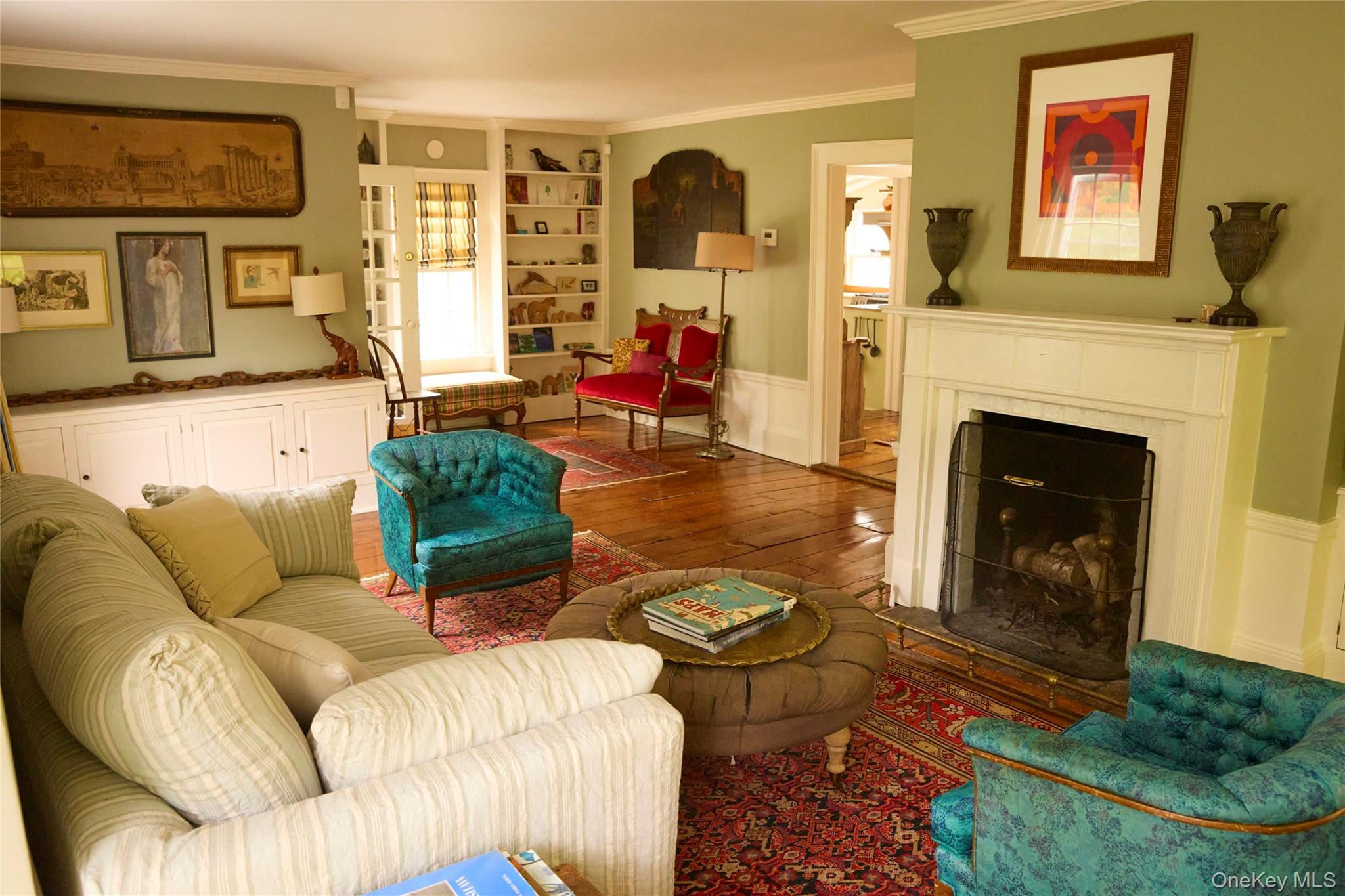 521 Barrett Hill Road Mahopac, NY 10541 - Photo 19 of 35 a living room with furniture and a fireplace