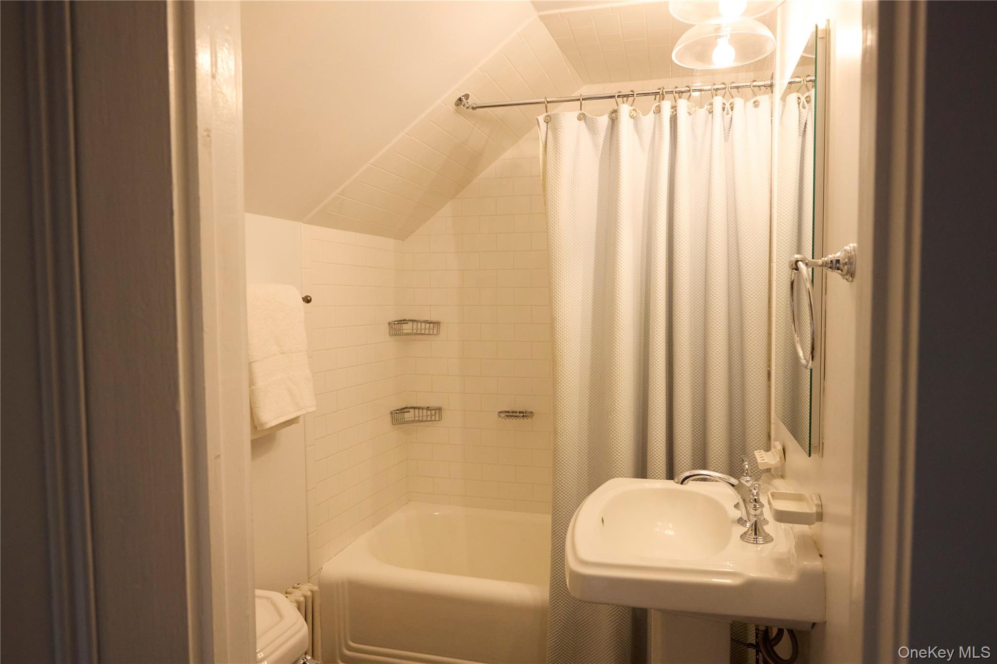 521 Barrett Hill Road Mahopac, NY 10541 - Photo 26 of 35 a bathroom with a granite countertop sink and a mirror