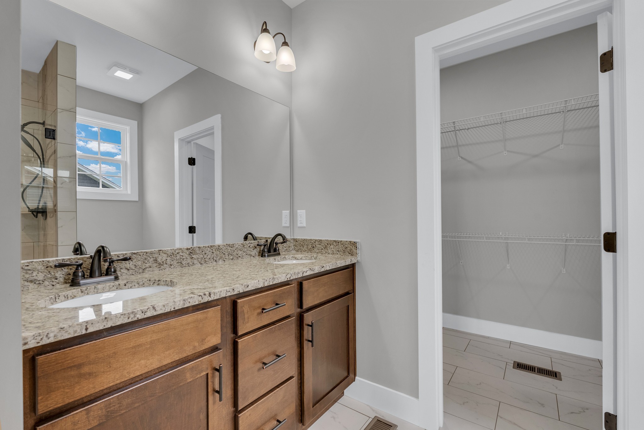 270 Locust Grove Road Cookeville, TN 38501 - Photo 16 of 34 a bathroom with a granite countertop sink and a mirror