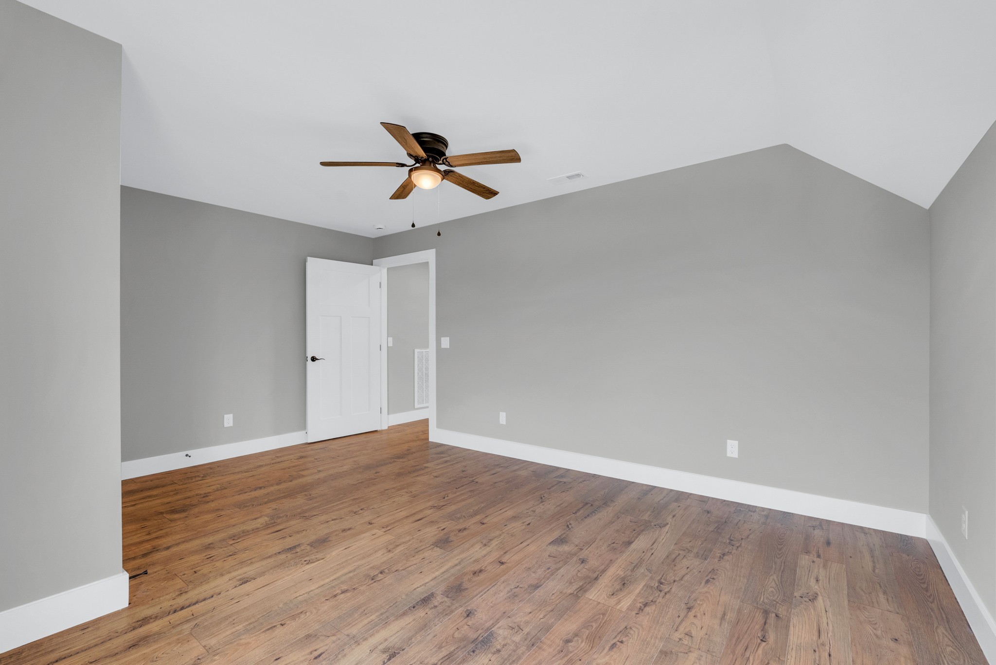 270 Locust Grove Road Cookeville, TN 38501 - Photo 18 of 34 a view of room with wooden floor and ceiling fan