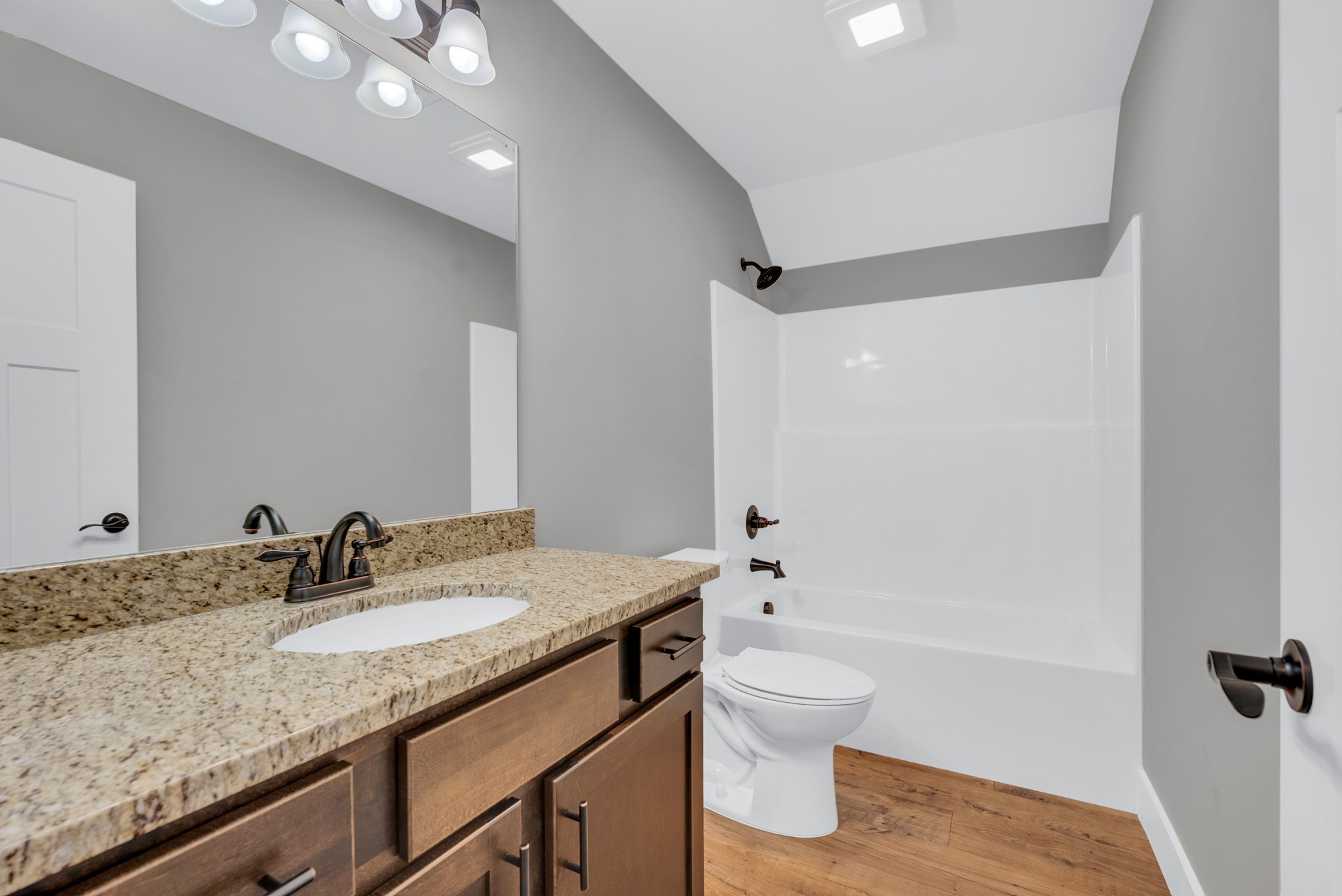 270 Locust Grove Road Cookeville, TN 38501 - Photo 20 of 34 a bathroom with a granite countertop sink a toilet and shower