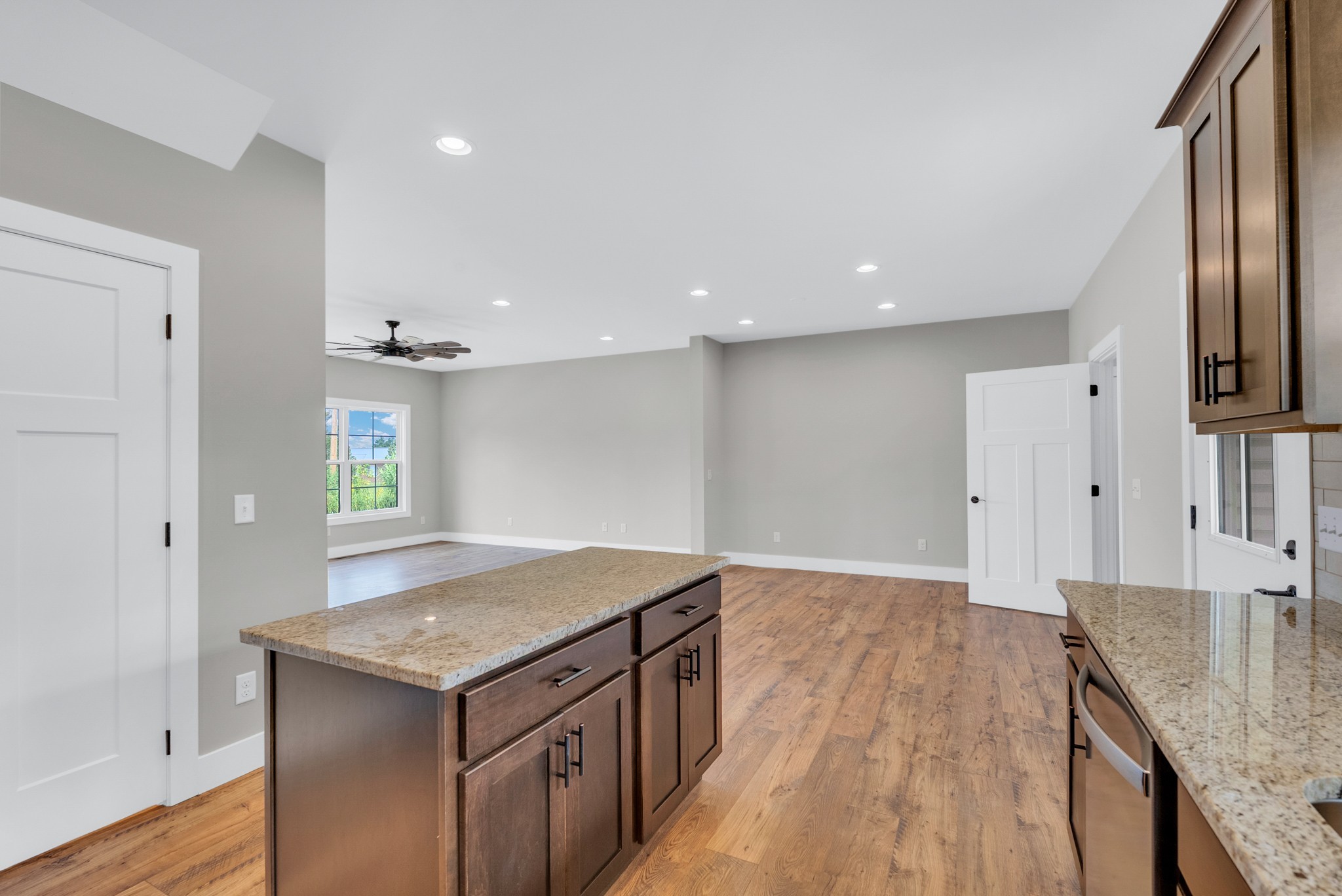 270 Locust Grove Road Cookeville, TN 38501 - Photo 3 of 34 a kitchen with granite countertop a stove and a sink
