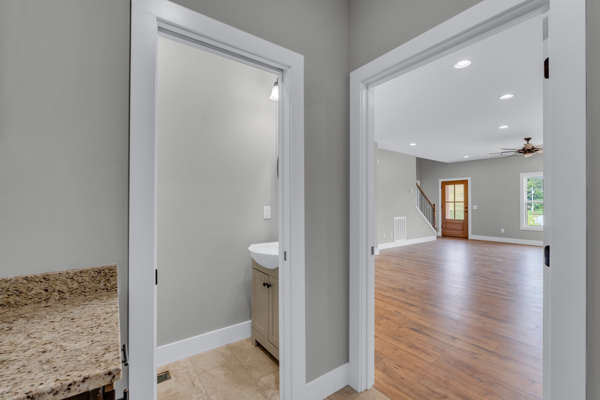 270 Locust Grove Road Cookeville, TN 38501 - Photo 34 of 34 a view of a hallway with wooden floor and a living room