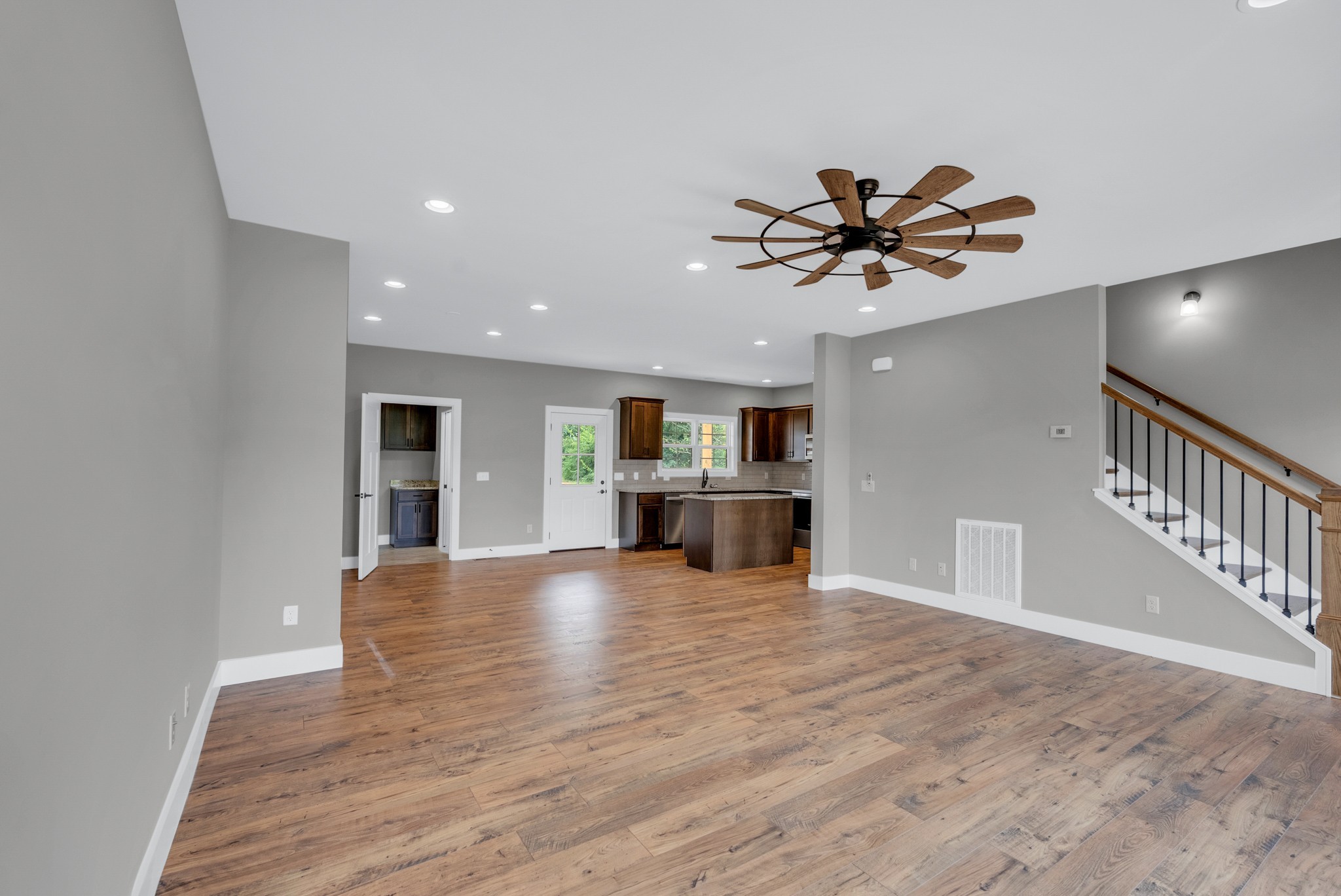 270 Locust Grove Road Cookeville, TN 38501 - Photo 10 of 34 a view of an empty room with a window and a kitchen