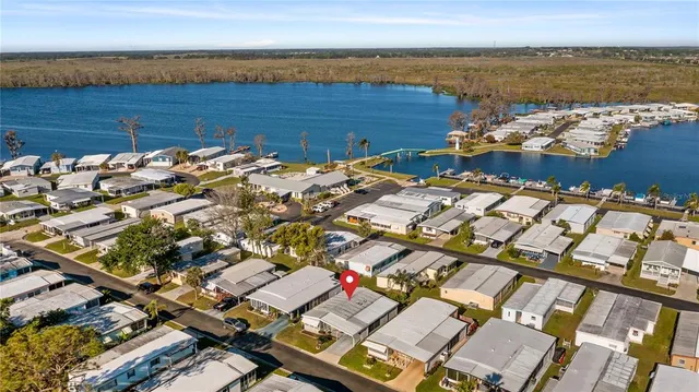 an aerial view of a houses with a outdoor space