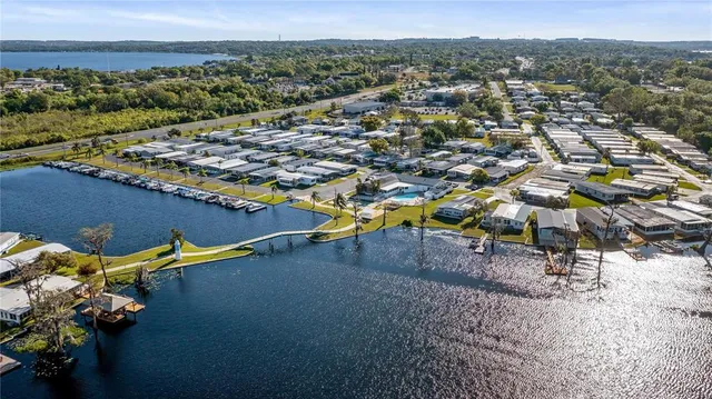 an aerial view of a house with a swimming pool