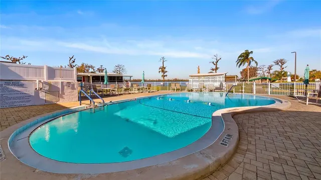 a view of a workspace with furniture and a area
