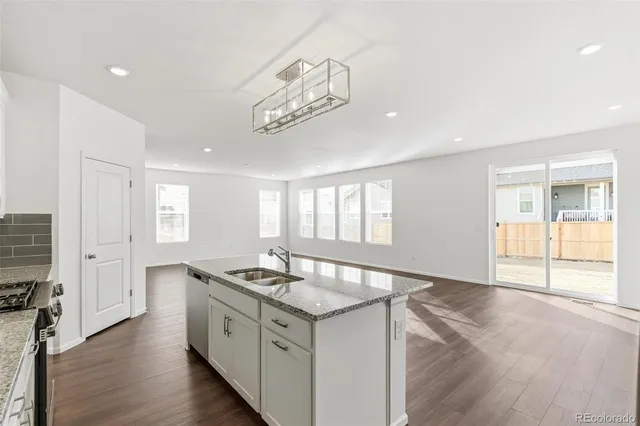 a bathroom with a sink a mirror and a toilet