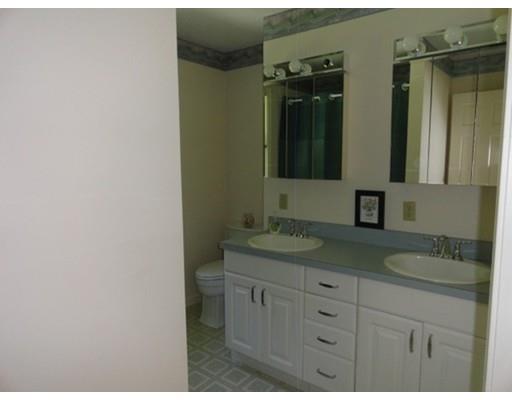 149 South Row Road Townsend, MA 01469 - Photo 20 of 34 a bathroom with a granite countertop sink and a mirror
