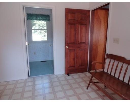 149 South Row Road Townsend, MA 01469 - Photo 5 of 34 a view of an entryway with a table and chair