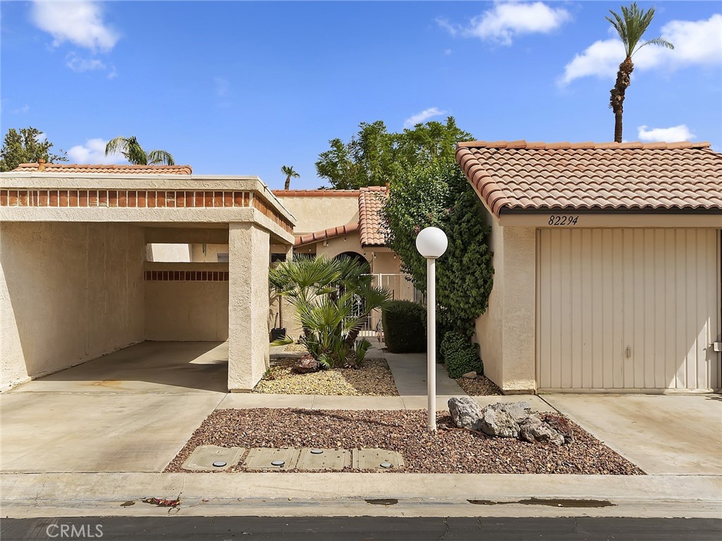 82294 Bergman Drive Indio, CA 92201 - Photo 19 of 22 a front view of a house