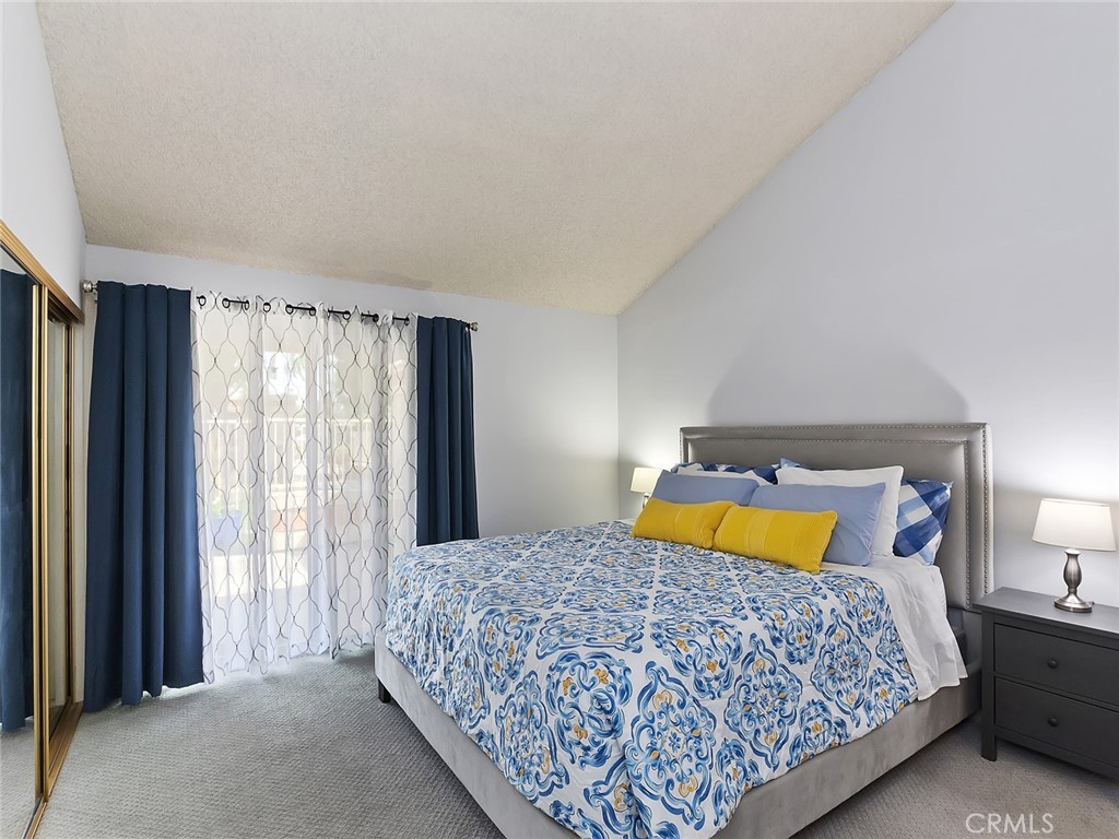 82294 Bergman Drive Indio, CA 92201 - Photo 8 of 22 a bedroom with a bed and window