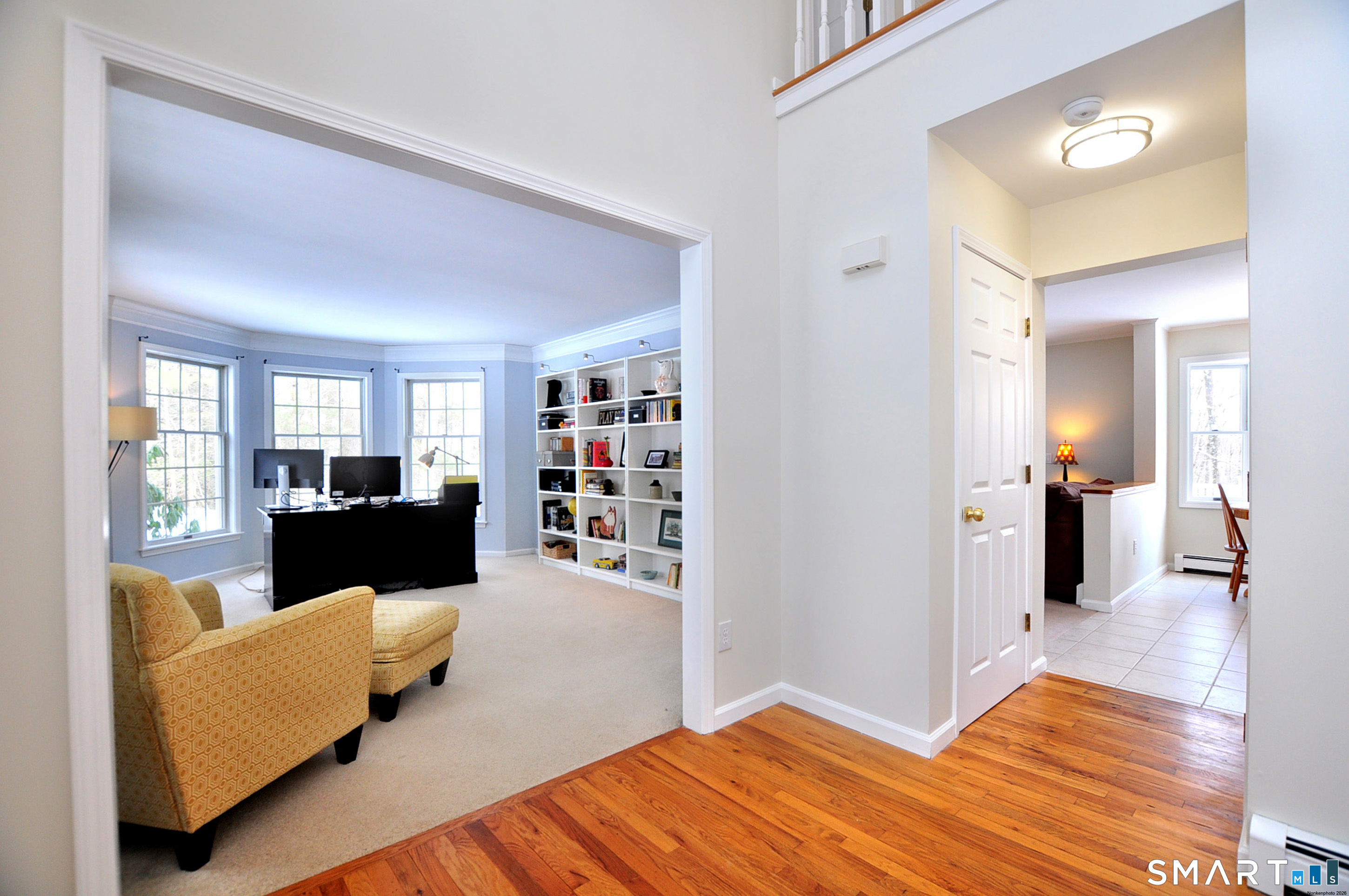 15 Greenwoods Road Granby, CT 06060 - Photo 11 of 41 a living room with furniture and wooden floor