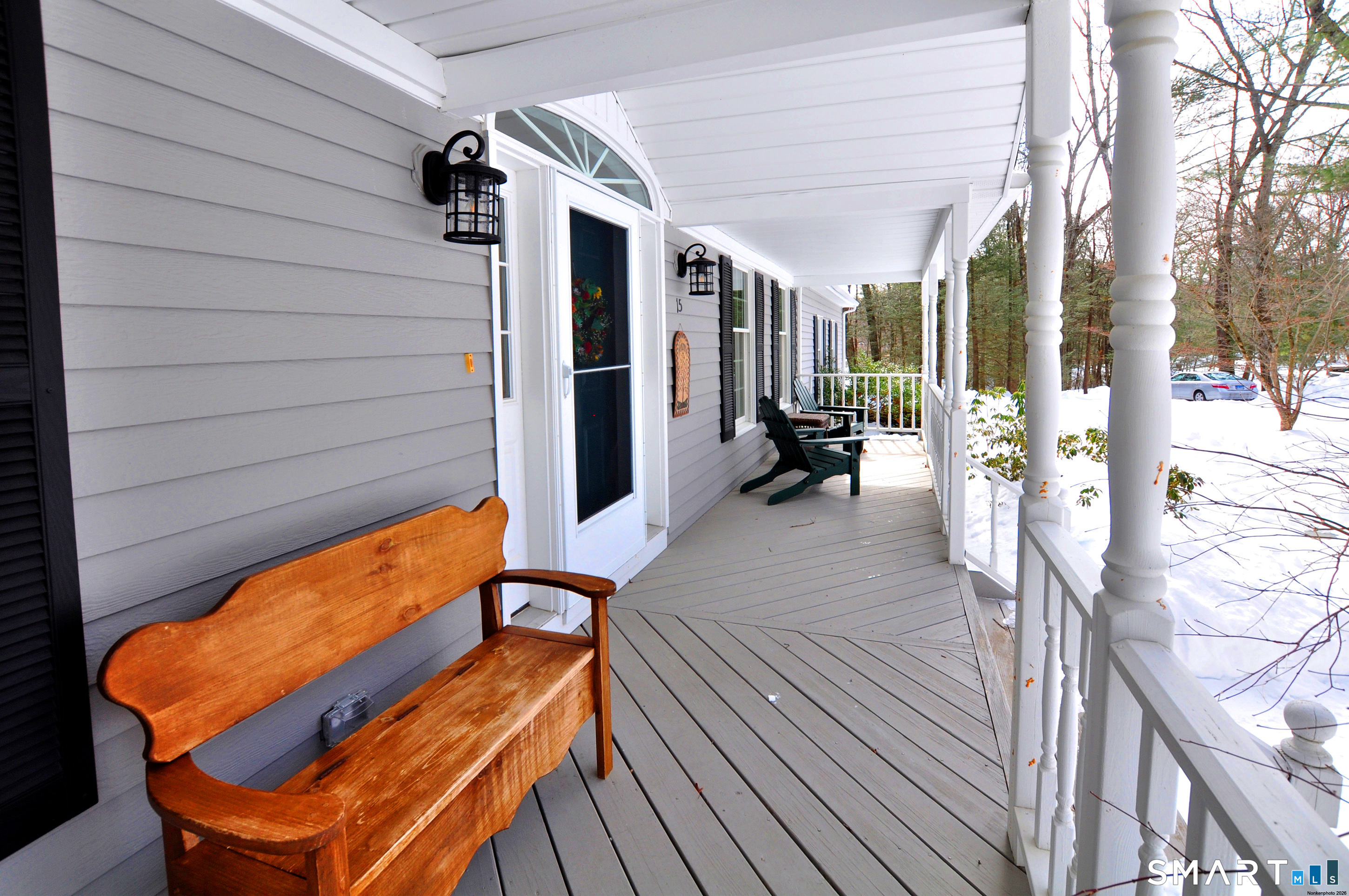 15 Greenwoods Road Granby, CT 06060 - Photo 20 of 41 a backyard of a house with seating space