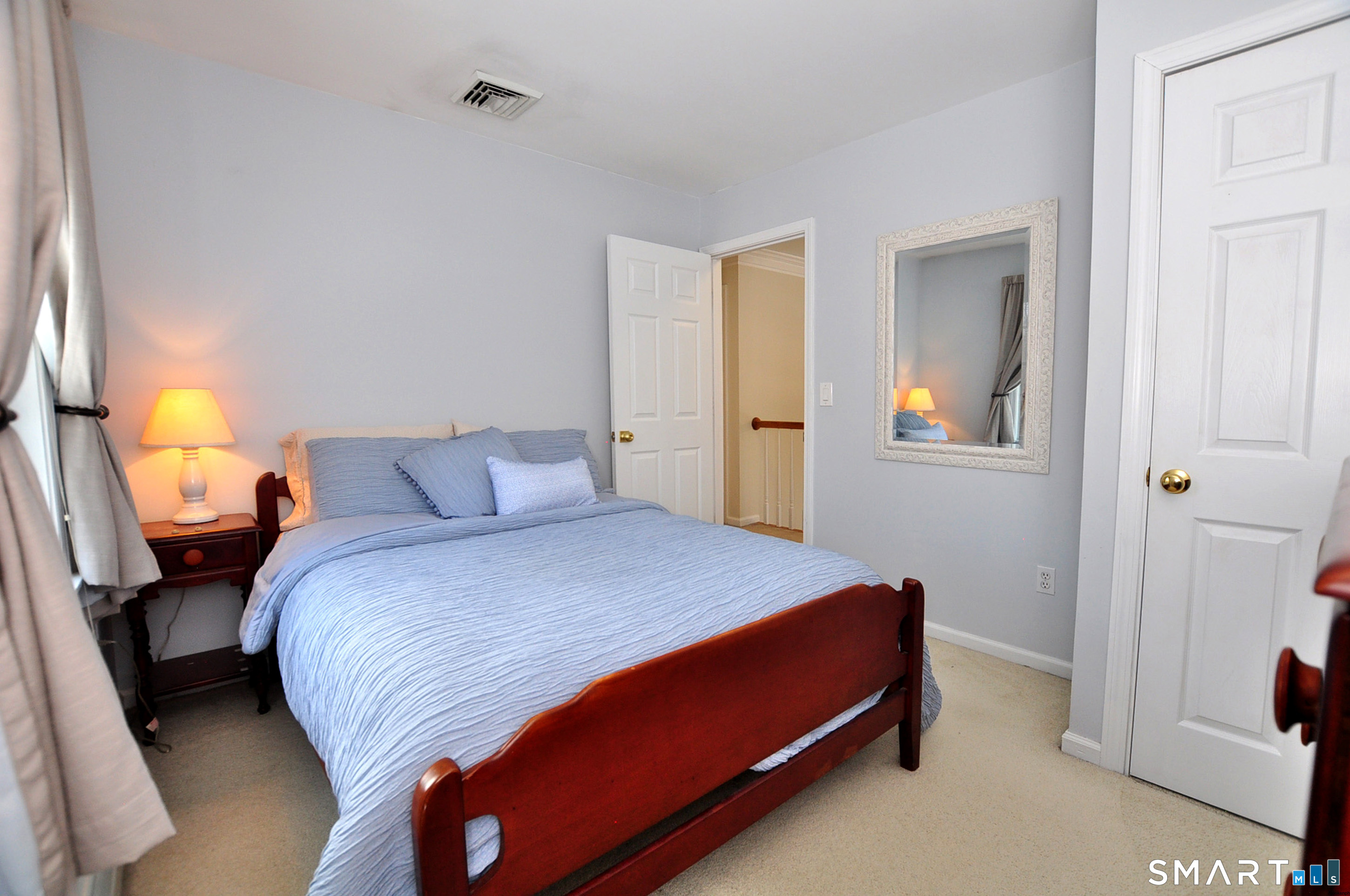 15 Greenwoods Road Granby, CT 06060 - Photo 23 of 41 a bedroom with a bed and a window