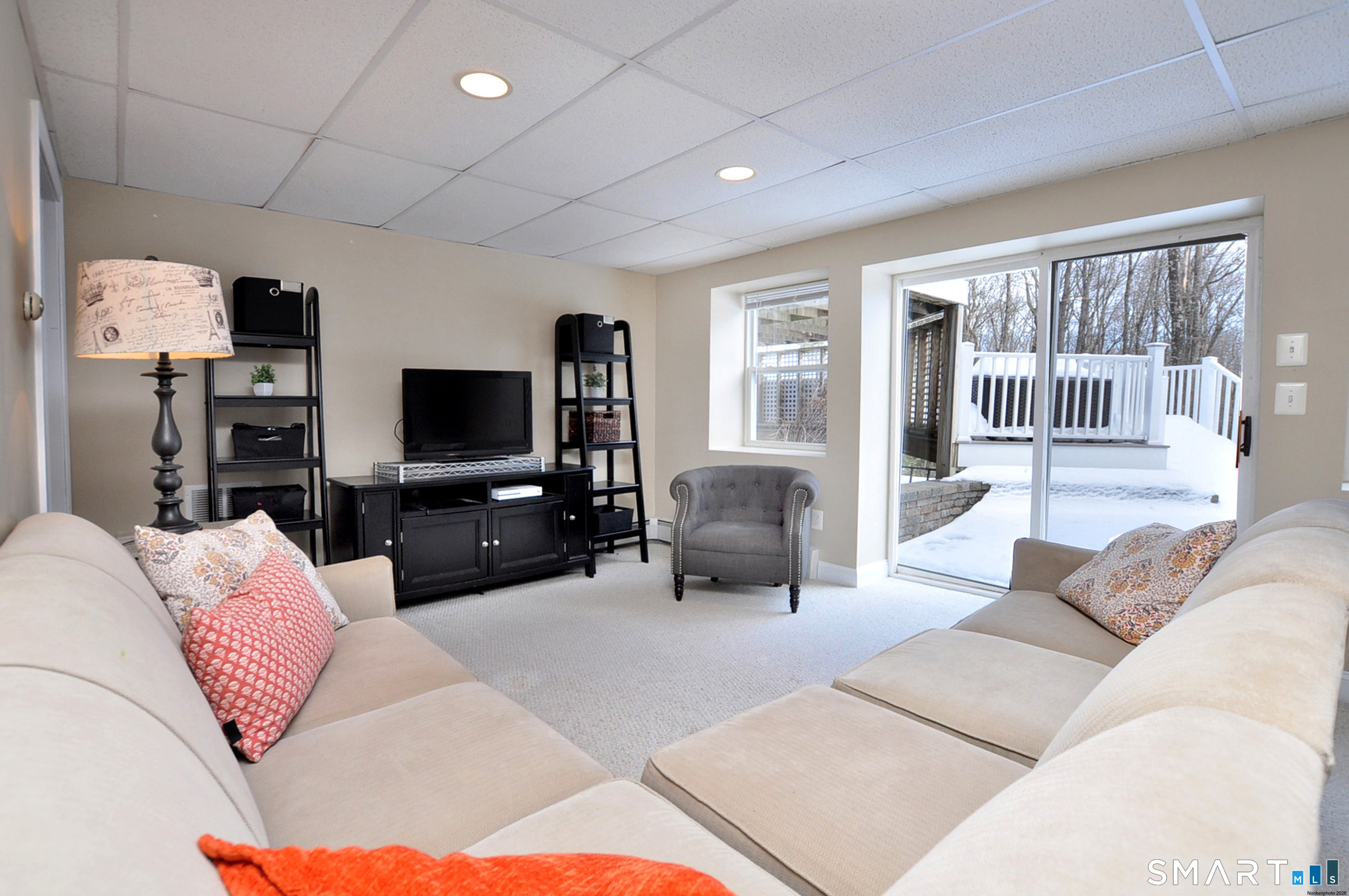 15 Greenwoods Road Granby, CT 06060 - Photo 29 of 41 a living room with furniture and a flat screen tv