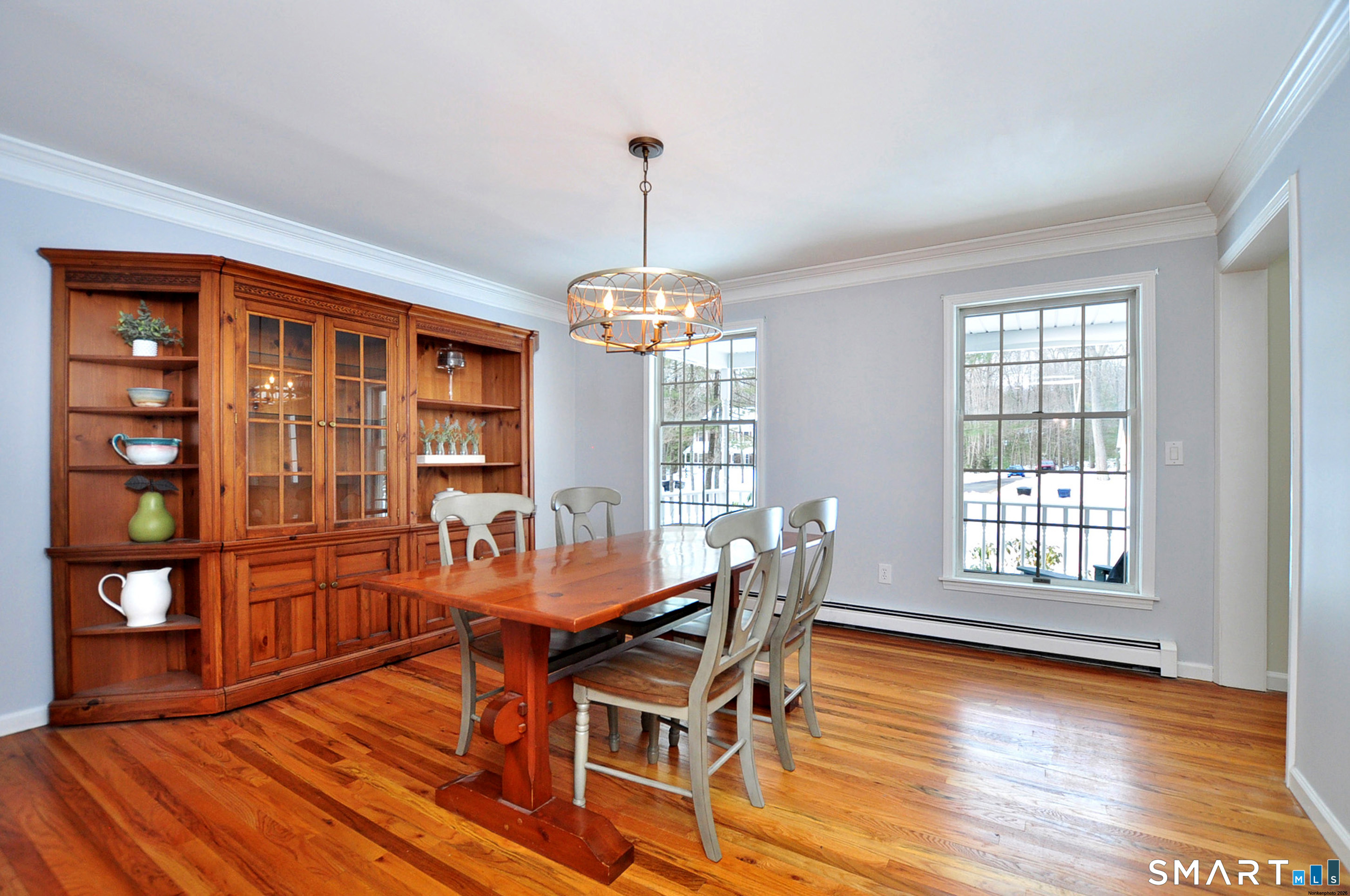 15 Greenwoods Road Granby, CT 06060 - Photo 35 of 41 a dining room with furniture and wooden floor