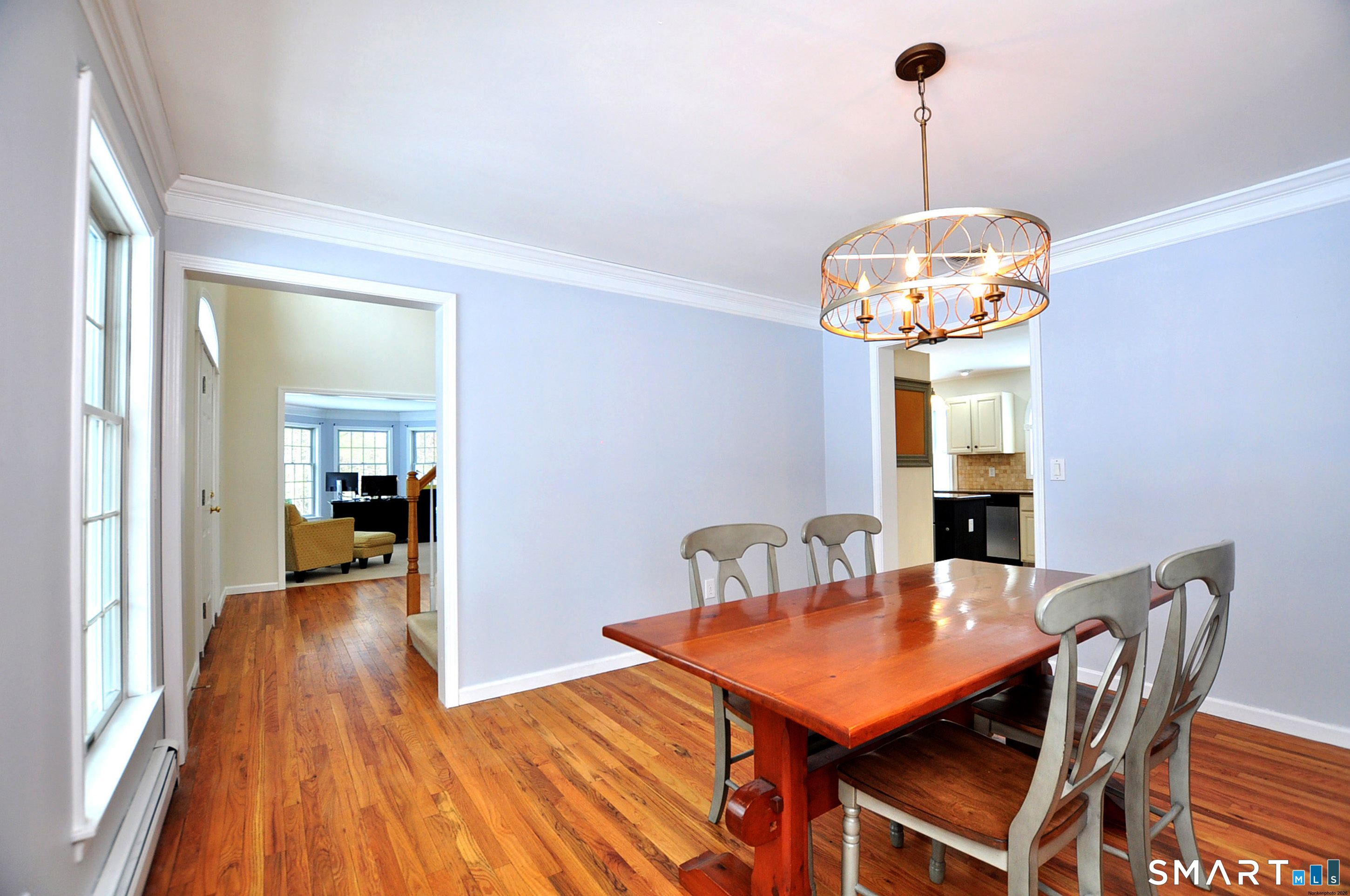 15 Greenwoods Road Granby, CT 06060 - Photo 36 of 41 a view of a dining room with furniture wooden floor and chandelier