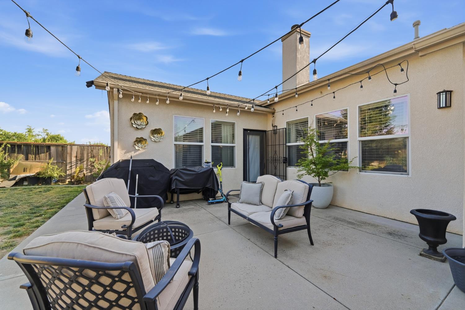 2220 Ellison Drive Modesto, CA 95355 - Photo 47 of 53 a outdoor living space with furniture and garden