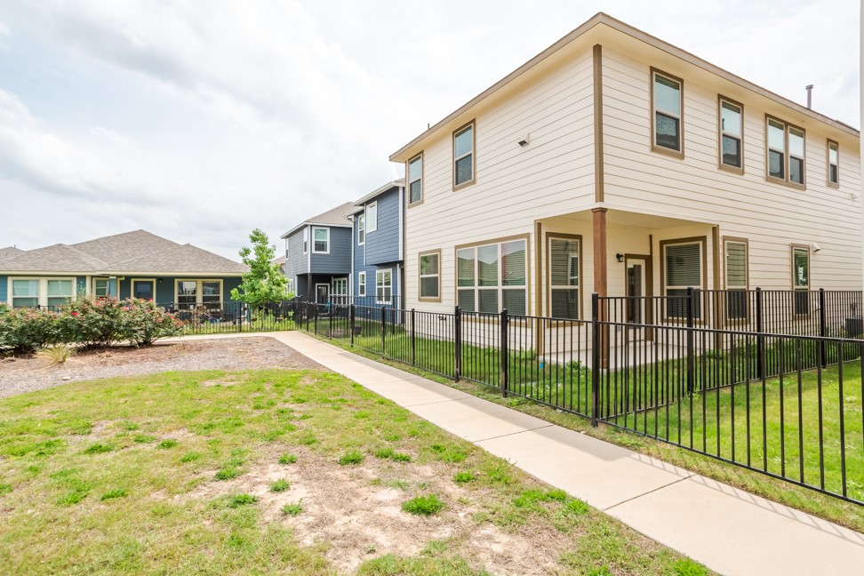 1600 Harwell Loop Kyle, TX 78640 - Photo 30 of 30 a view of a house with swimming pool and sitting area