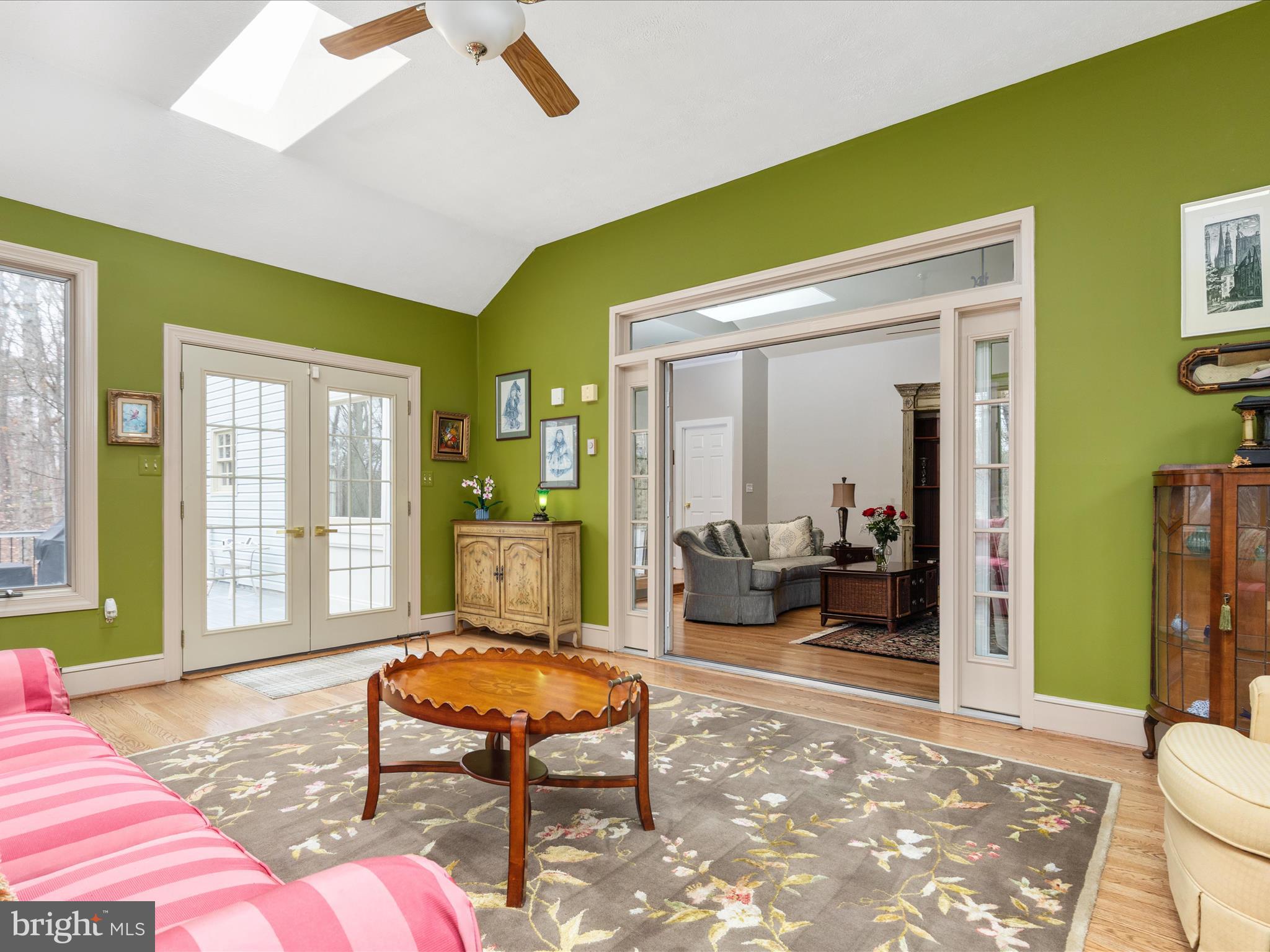 11701 Henderson Road Clifton, VA 20124 - Photo 11 of 61 a bedroom with a bed and large windows