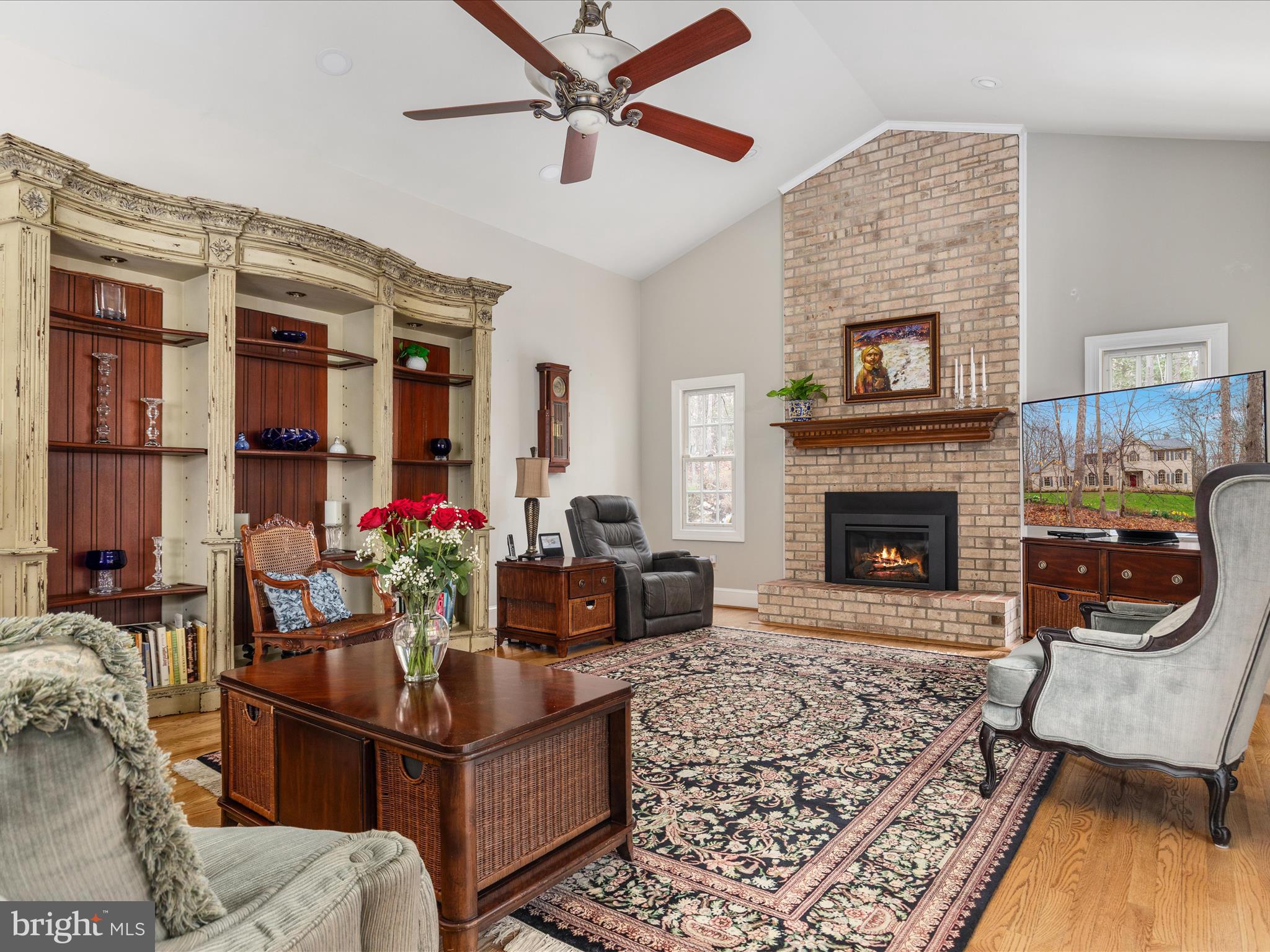 11701 Henderson Road Clifton, VA 20124 - Photo 12 of 61 a living room with furniture and a fireplace