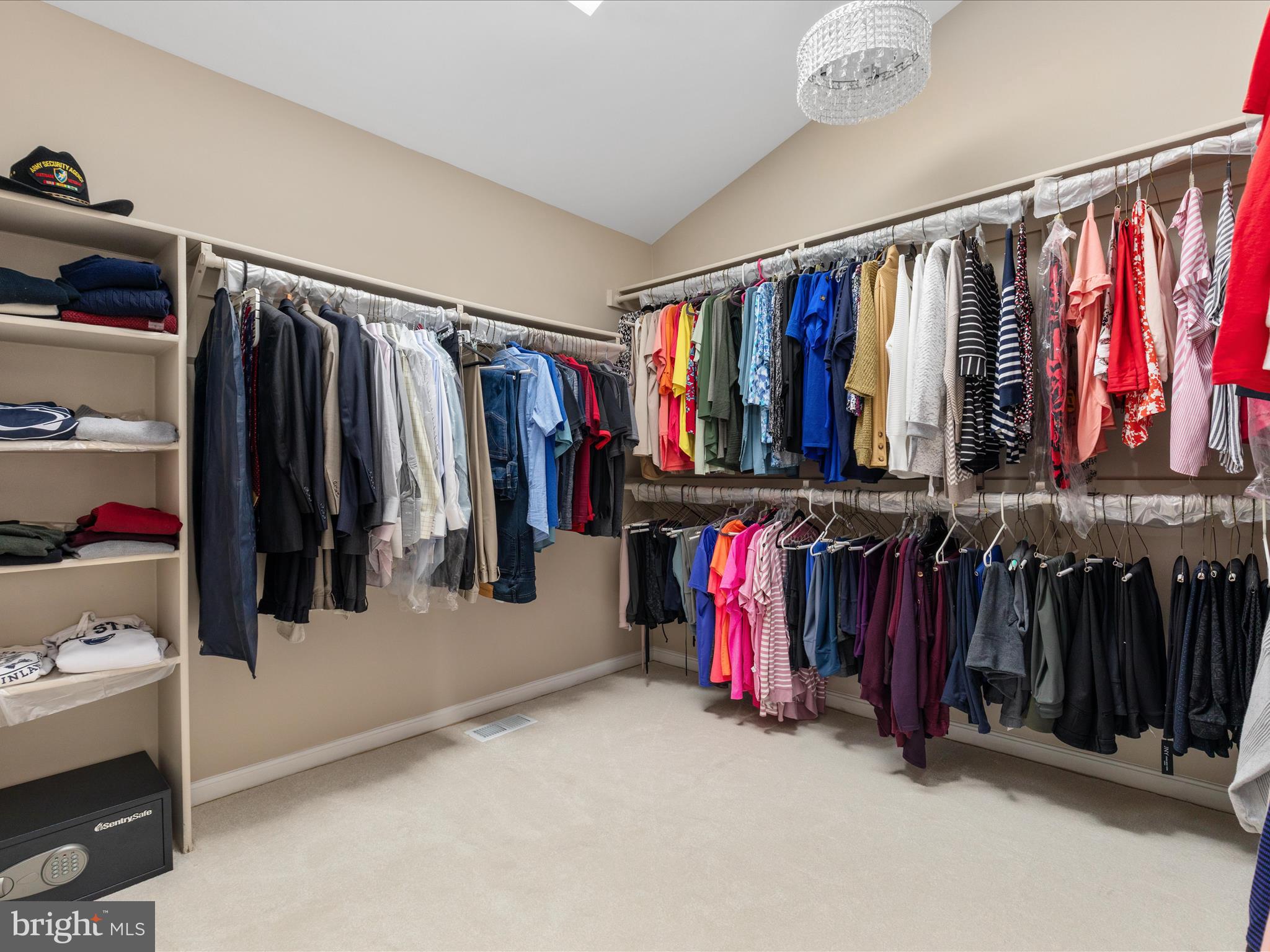 11701 Henderson Road Clifton, VA 20124 - Photo 29 of 61 a view of walk in closet with clothes and shoes